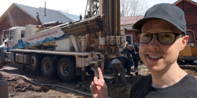 Matt Ferrell in front of a drill truck