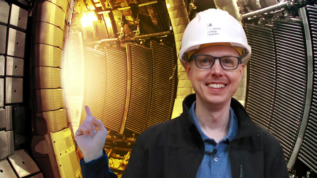 Matt Ferrell pointing at the inside of a Nuclear Fusion reactor